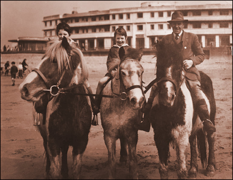 Jack Lupton and his ponies on the beach at the rear of the hotel