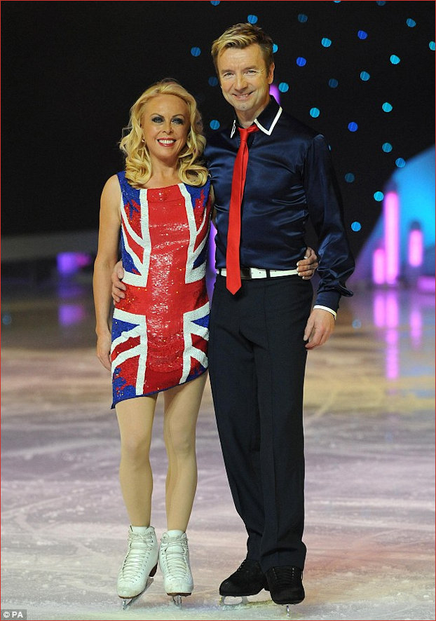 Torvill and dean drape themselves in the Union Jack
