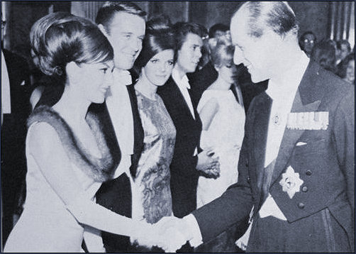 Michele Mercier receives the customary handshake and is presentated to Prince Philip
