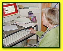 Anne Golon at a computer screen