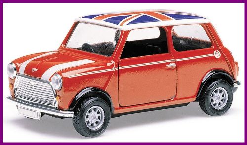 Corgi Mini sporting a red white and blue Union Jack roof