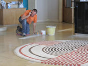 Man at work on mosaics