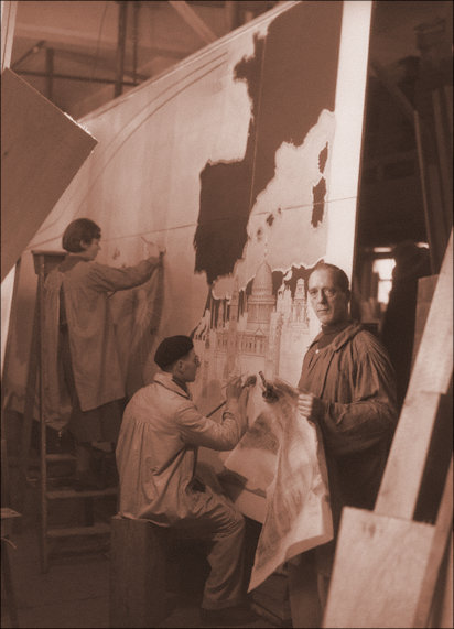 MacDonald Gill and two assistants working on the map