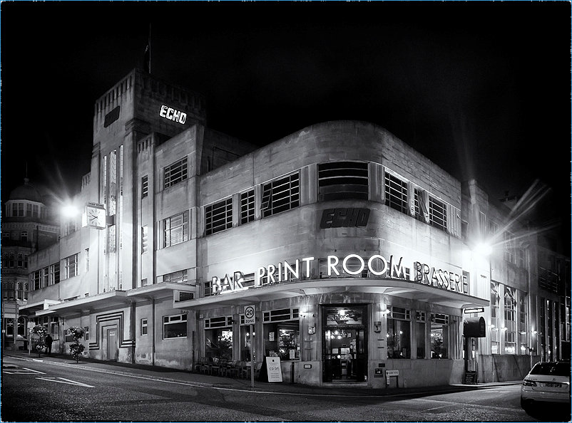 The Bournemouth EchcoBar Print Room lit up at night