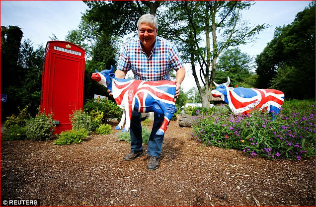 Telephone Kiosk and patriotic cows