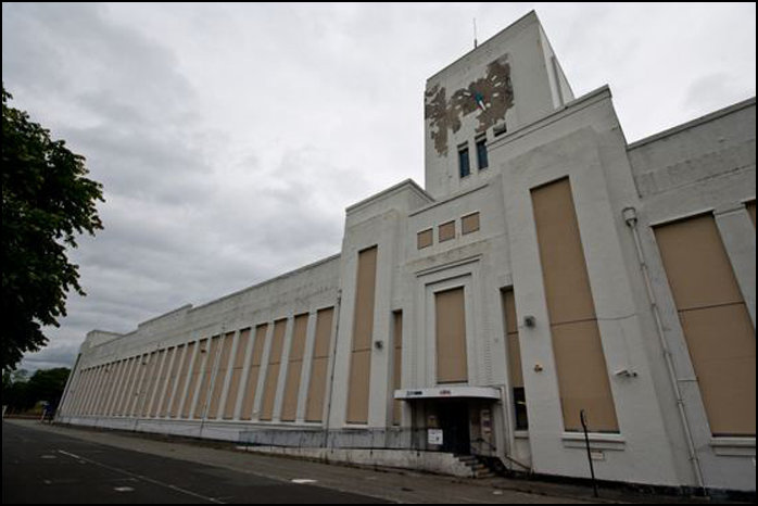 Boarded up exterior in August 2011