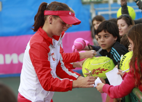 Aga signing autographs