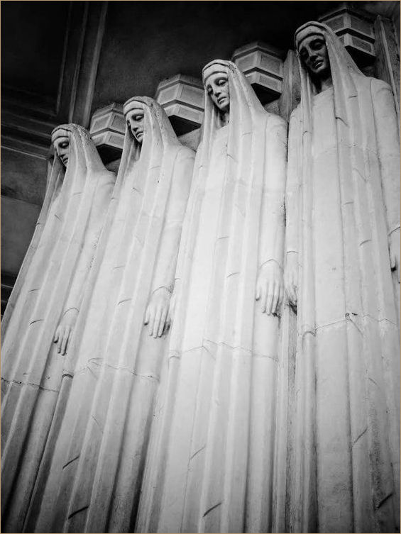 Statues entrance to Cemetery