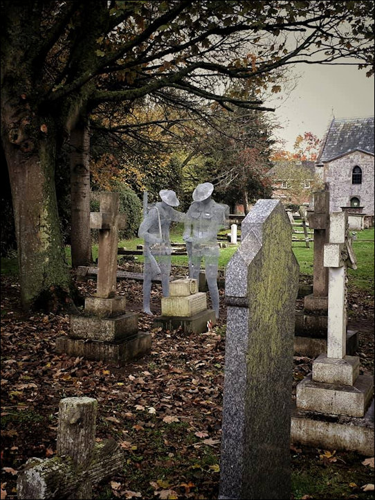 A pair of Ghost Soldiers by a headstone