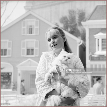 Mia Farrow and Cat