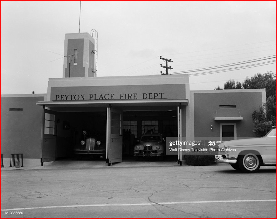 Frontage of the Peyton Place Fire Department with two fire vehicles visible