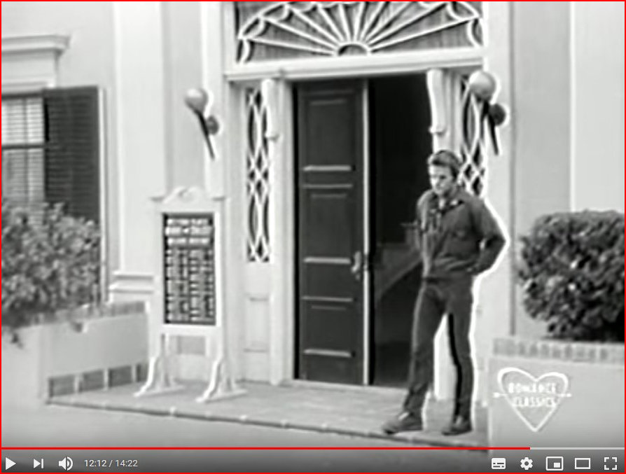 Lee at the entrance of the Banking Trust