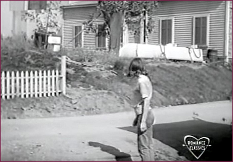 Dirt road at the rear of Ada's Tavern