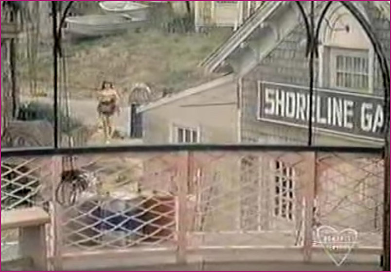 Rita returning from the beach via Wharf and Shoreline Garage