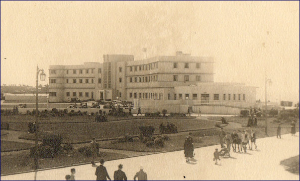 Midland Hotel early postcards with array of parked vehicles
